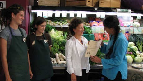 FOGs-work-on-the-Agricultural-Justice-Project.-Bluff-Country-Co-op-receiving-Food-Justice-Certification. FOG's work on the Agricultural Justice Project helps farms and businesses like Bluff Country Co-op receive Food Justice Certification.